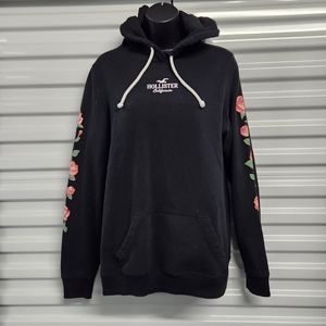 Hollister Hoodie with kangaroo pouch and floral sleeves.